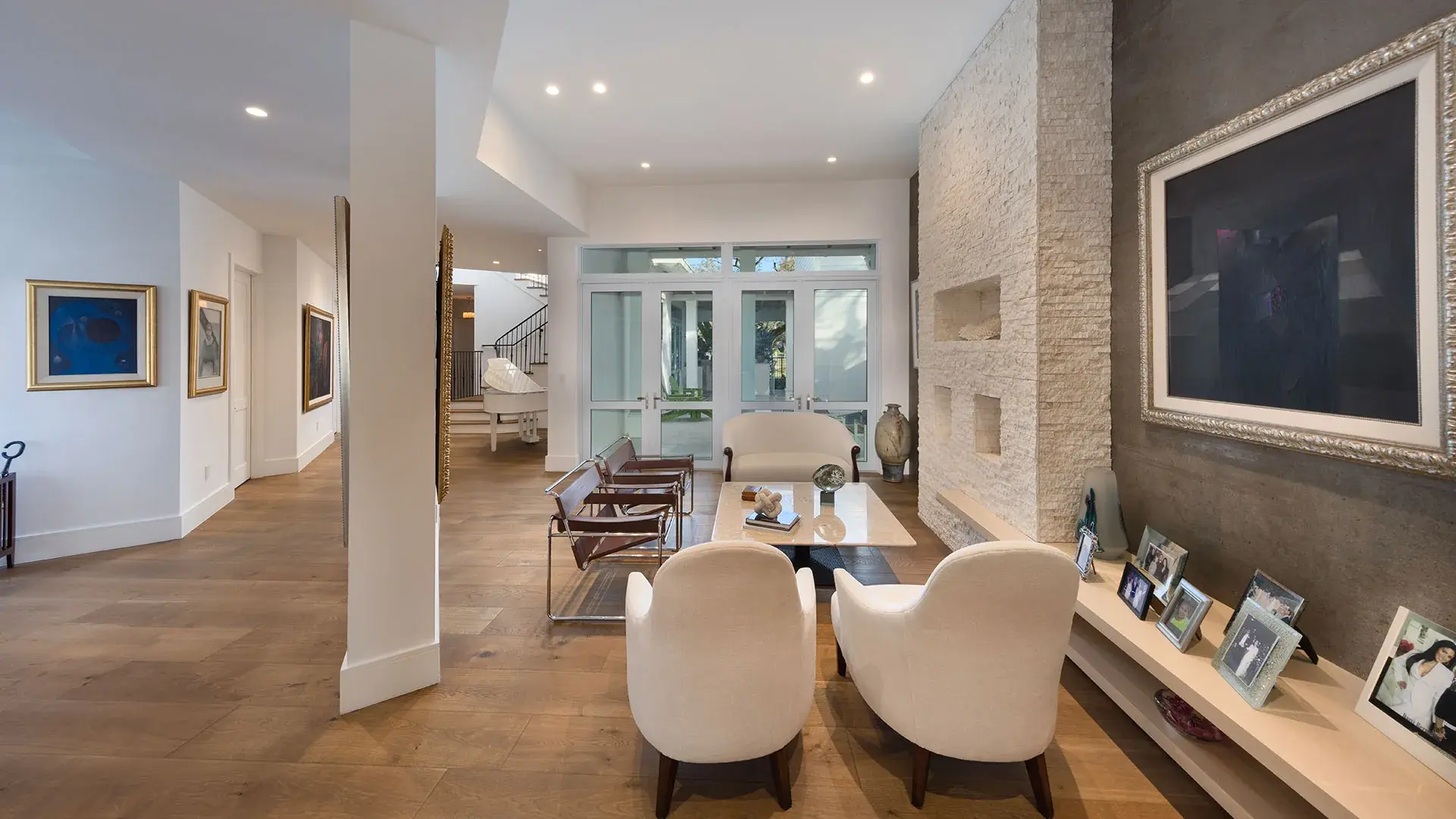1238 Malaga — interior hallway with sculpture and art